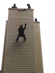 My brother, 50 feet in the air during a firefighter's  training exercise.